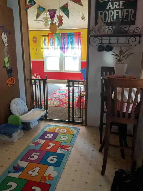 Indoor space with hopscotch rug and colorful decor